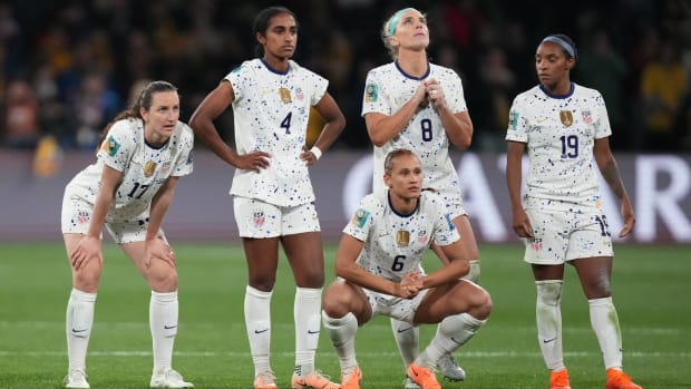 The United States Women's National Team watches penalty kicks during a Round of 16 matchup vs. Sweden at the World Cup.